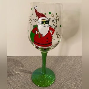 He sees you when you’re drinking Santa wine glass.  EUC